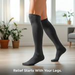 A person wearing knee-high compression socks, standing with good posture, conveying relief and support for common back pain problems and how to solve them.